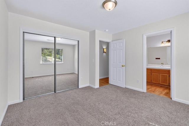 4729 Lookout Mountain Rd, Mariposa, CA 95338 - unfurnished bedroom with light colored carpet, a closet, and ensuite bathroom