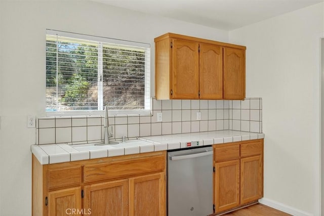 4729 Lookout Mountain Rd, Mariposa, CA 95338 - kitchen featuring dishwasher, tasteful backsplash, and tile counters