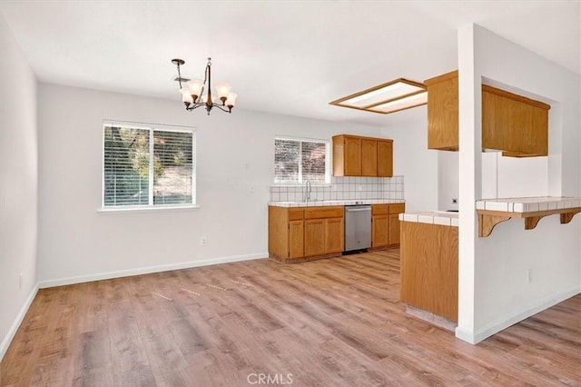 4729 Lookout Mountain Rd, Mariposa, CA 95338 - kitchen with dishwasher, tile countertops, light wood-style flooring, and healthy amount of natural light