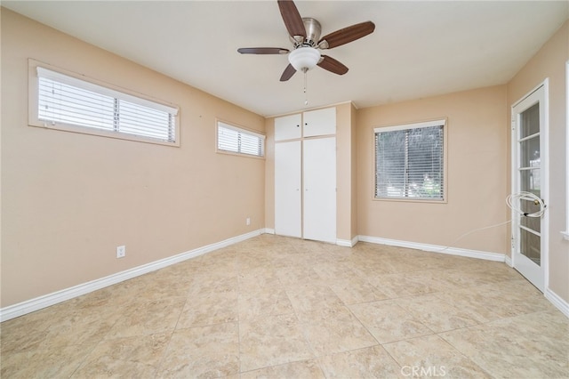 3986 Tomlinson, Riverside, CA 92503 - unfurnished bedroom featuring a closet, ceiling fan, and light tile patterned flooring