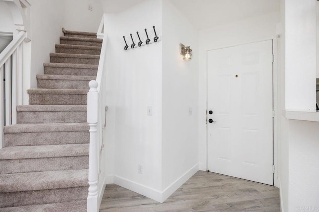 11375 Affinity Ct Unit 206, San Diego, CA 92131 - staircase with wood finished floors and baseboards