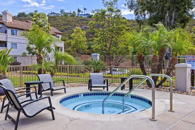 11375 Affinity Ct Unit 206, San Diego, CA 92131 - view of swimming pool featuring a hot tub