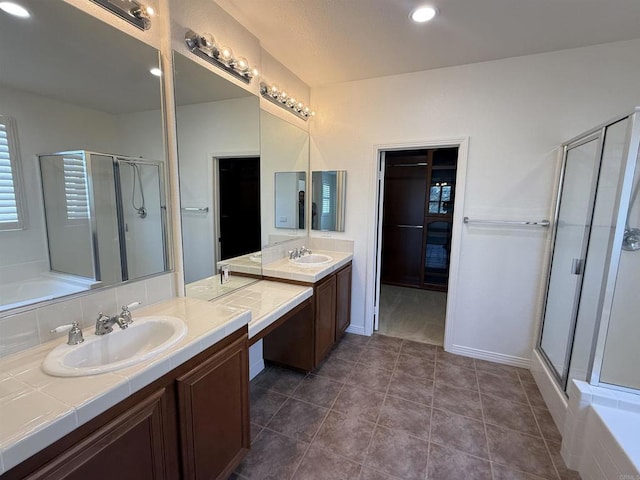 106 Chesapeake Ct, San Marcos, CA 92069 - bathroom featuring a stall shower, two vanities, a garden tub, recessed lighting, and tile patterned floors