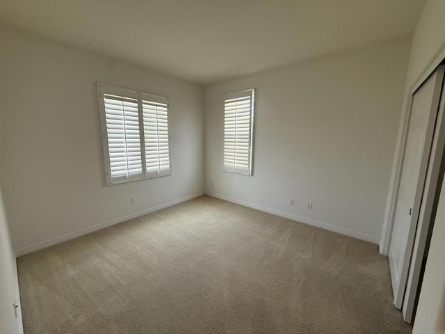 106 Chesapeake Ct, San Marcos, CA 92069 - unfurnished bedroom featuring light colored carpet and a closet