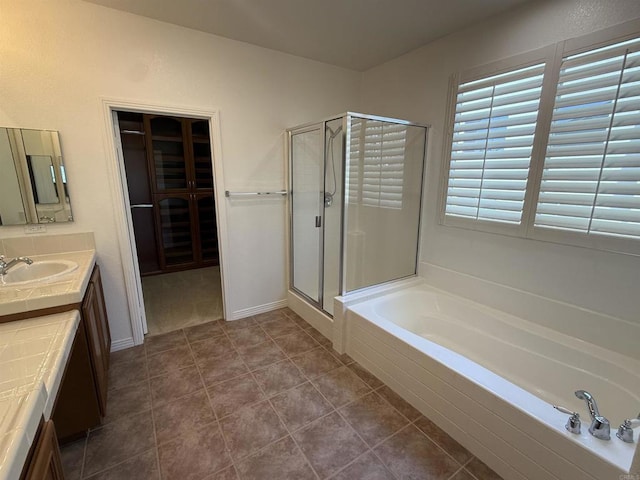 106 Chesapeake Ct, San Marcos, CA 92069 - bathroom with vanity, a garden tub, a shower stall, and tile patterned flooring