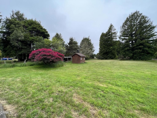 21560 Bald Hill Rd, Fort Bragg, CA 95437 - view of grassy yard featuring a storage shed