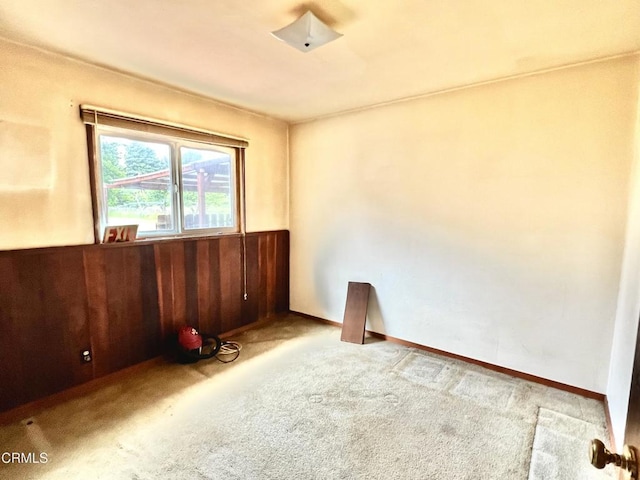 21560 Bald Hill Rd, Fort Bragg, CA 95437 - empty room with carpet, wood walls, and a wainscoted wall