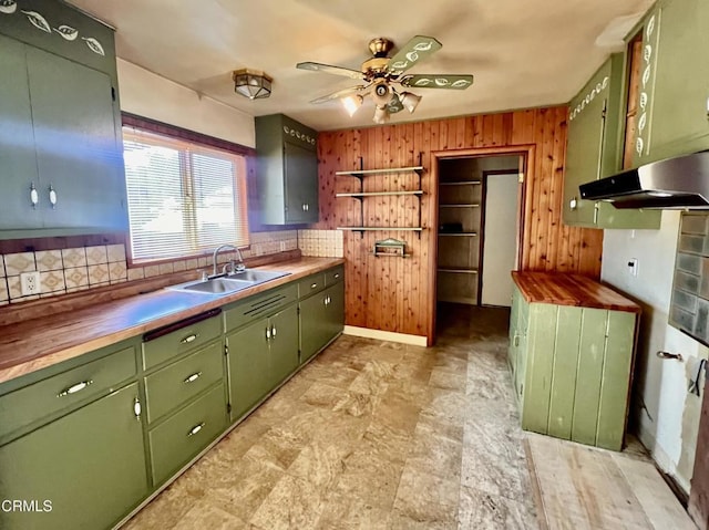 21560 Bald Hill Rd, Fort Bragg, CA 95437 - kitchen with green cabinets, wood walls, wood counters, a ceiling fan, and backsplash