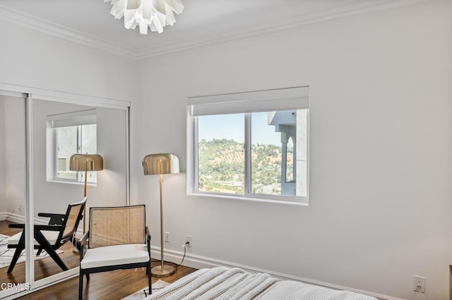 453 Frontenac Ave, Los Angeles, CA 90065 - living area with ornamental molding, wood finished floors, and a chandelier
