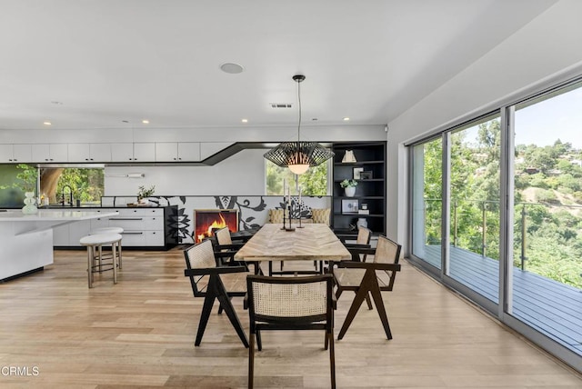 453 Frontenac Ave, Los Angeles, CA 90065 - dining area featuring plenty of natural light, light wood-style floors, and recessed lighting