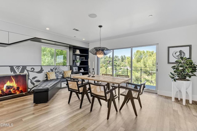 453 Frontenac Ave, Los Angeles, CA 90065 - dining space featuring light wood finished floors, recessed lighting, and a chandelier