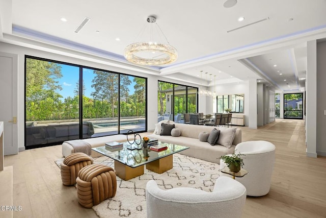 4828 Oakwood Ave, La Canada Flintridge, CA 91011 - living room featuring a chandelier, light wood-style flooring, healthy amount of natural light, and recessed lighting