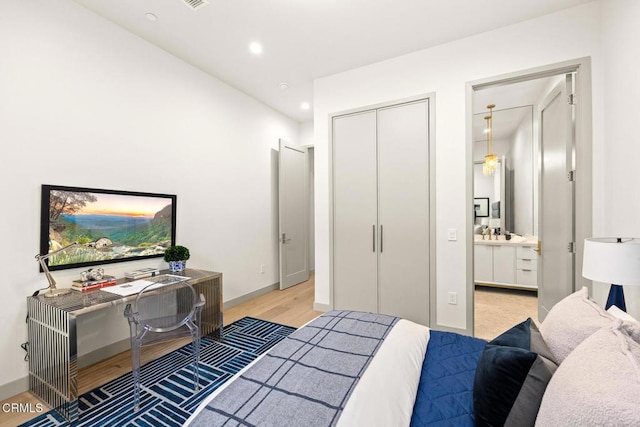 4828 Oakwood Ave, La Canada Flintridge, CA 91011 - bedroom with light wood-style floors, recessed lighting, connected bathroom, a closet, and an office area