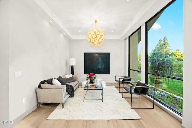 4828 Oakwood Ave, La Canada Flintridge, CA 91011 - living area with a chandelier, wood finished floors, and a tray ceiling