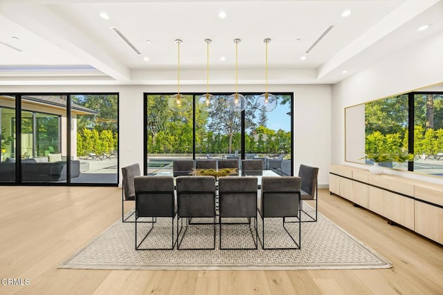 4828 Oakwood Ave, La Canada Flintridge, CA 91011 - dining area with a tray ceiling and light wood finished floors