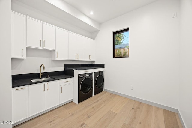 4828 Oakwood Ave, La Canada Flintridge, CA 91011 - laundry area featuring washing machine and clothes dryer, light wood finished floors, recessed lighting, and cabinet space