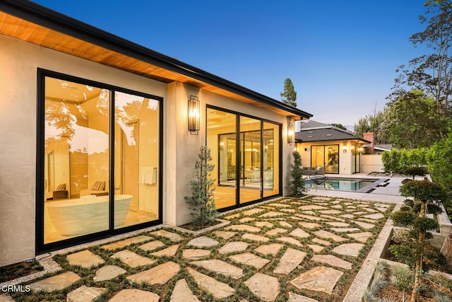 4828 Oakwood Ave, La Canada Flintridge, CA 91011 - back of property featuring a patio, an outdoor pool, and stucco siding