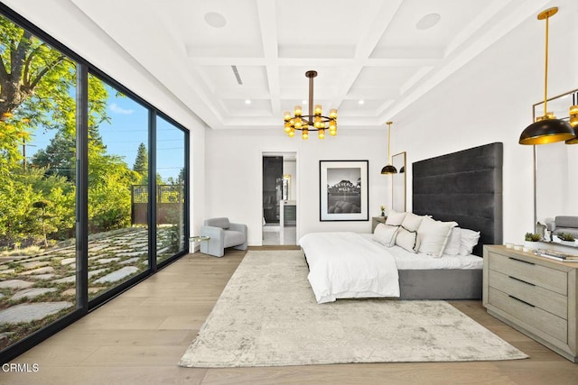 4828 Oakwood Ave, La Canada Flintridge, CA 91011 - bedroom featuring a chandelier, coffered ceiling, beamed ceiling, wood finished floors, and ensuite bathroom