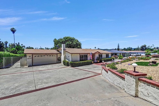 1235 Via Rancho Pkwy, Escondido, CA 92029 - single story home featuring concrete driveway, a garage, and stucco siding