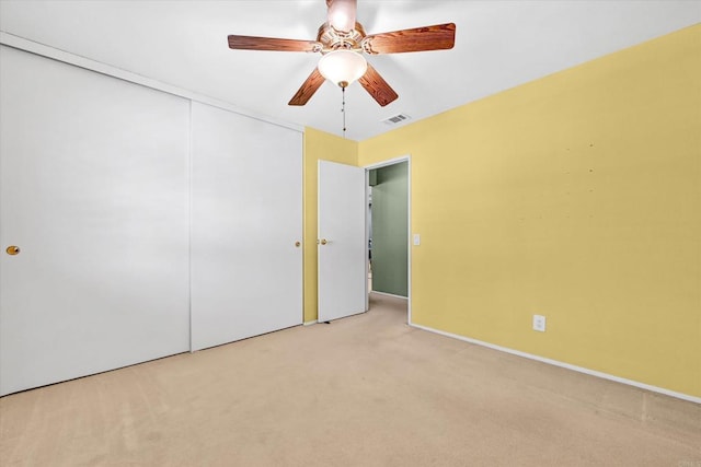 1235 Via Rancho Pkwy, Escondido, CA 92029 - unfurnished bedroom featuring carpet, a closet, and a ceiling fan