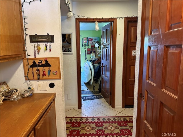 32078 Del Cielo Oeste, Bonsall, CA 92003 - hallway with light tile patterned flooring and a textured wall