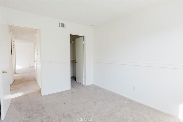 28023 Robin Ave, Saugus, CA 91350 - unfurnished bedroom featuring carpet and a walk in closet