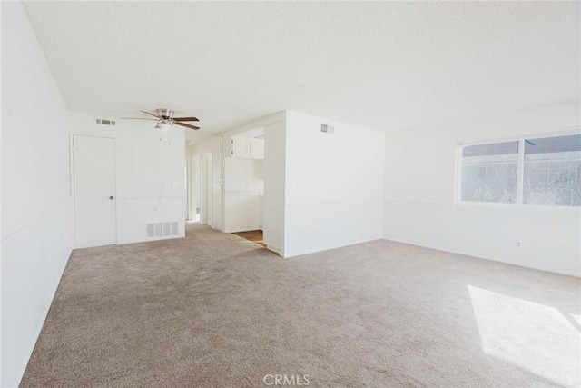28023 Robin Ave, Saugus, CA 91350 - carpeted empty room with a ceiling fan and a textured ceiling