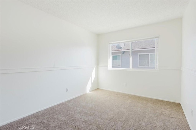 28023 Robin Ave, Saugus, CA 91350 - carpeted spare room with a textured ceiling