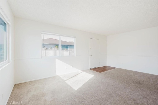 28023 Robin Ave, Saugus, CA 91350 - carpeted empty room featuring a textured ceiling