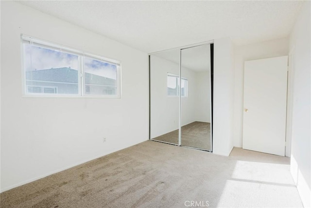 28023 Robin Ave, Saugus, CA 91350 - unfurnished bedroom featuring carpet floors and a closet