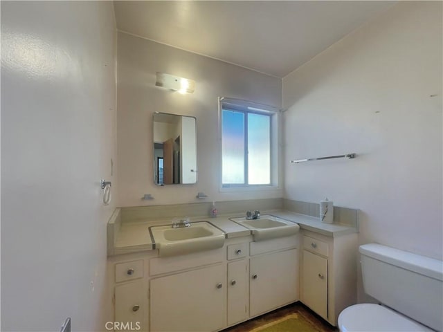 11753 Kling St, Valley Village, CA 91607 - bathroom featuring toilet and double vanity