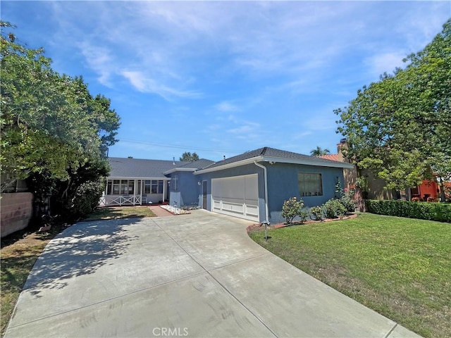 11753 Kling St, Valley Village, CA 91607 - ranch-style house with stucco siding, a garage, concrete driveway, a front yard, and a chimney