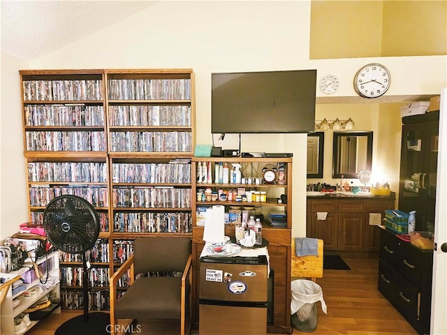 675 N Lark Ellen Ave, Covina, CA 91722 - sitting room with lofted ceiling and wood finished floors