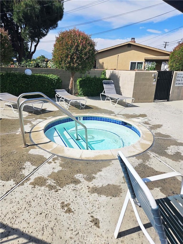 675 N Lark Ellen Ave, Covina, CA 91722 - view of pool with a community hot tub and a patio