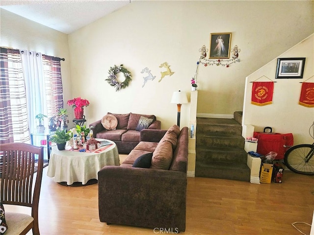 675 N Lark Ellen Ave, Covina, CA 91722 - living room with wood finished floors and stairs