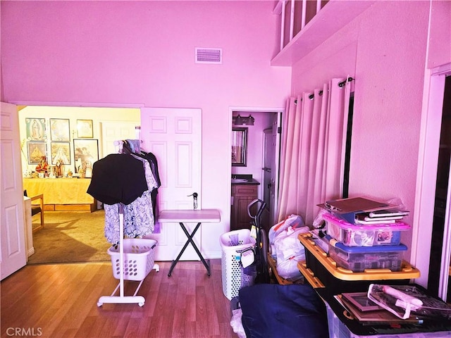 675 N Lark Ellen Ave, Covina, CA 91722 - living area featuring a high ceiling and wood finished floors