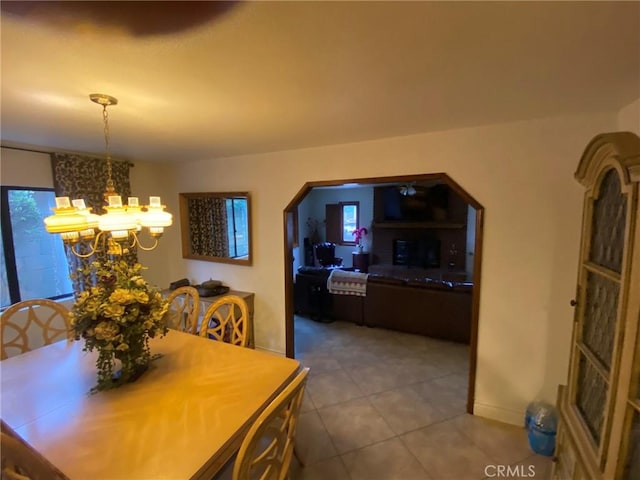 4323 Annisa Ave, Hemet, CA 92544 - dining room with a chandelier, tile patterned floors, and arched walkways