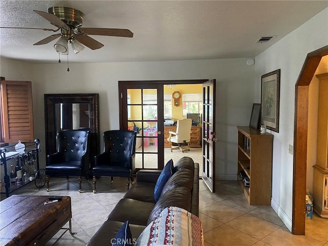 4323 Annisa Ave, Hemet, CA 92544 - living area featuring light tile patterned floors, a ceiling fan, and french doors