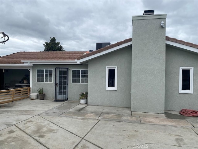 4323 Annisa Ave, Hemet, CA 92544 - back of property with a patio, stucco siding, and a chimney
