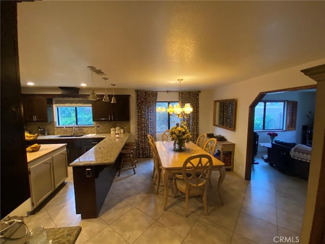 4323 Annisa Ave, Hemet, CA 92544 - dining area featuring a chandelier, light tile patterned floors, and recessed lighting
