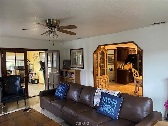 4323 Annisa Ave, Hemet, CA 92544 - living area featuring ceiling fan, light tile patterned floors, and a textured ceiling