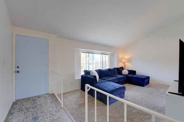 1547 Cochabamba St, San Diego, CA 92154 - carpeted living room featuring lofted ceiling and baseboards