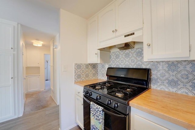 1547 Cochabamba St, San Diego, CA 92154 - kitchen featuring black range with gas cooktop, under cabinet range hood, and white cabinetry