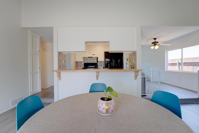 1547 Cochabamba St, San Diego, CA 92154 - dining room featuring light wood finished floors and ceiling fan
