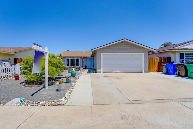 1547 Cochabamba St, San Diego, CA 92154 - single story home featuring driveway, a garage, and stucco siding
