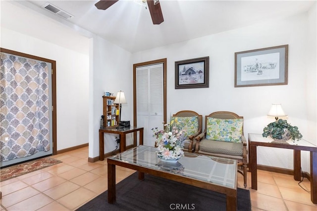 65380 San Lucas Rd, Lockwood, CA 93932 - living area with light tile patterned flooring and ceiling fan