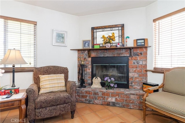 65380 San Lucas Rd, Lockwood, CA 93932 - living area with plenty of natural light, tile patterned flooring, and a brick fireplace