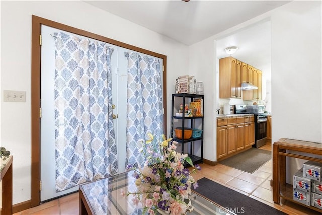 65380 San Lucas Rd, Lockwood, CA 93932 - dining area featuring light tile patterned floors and baseboards