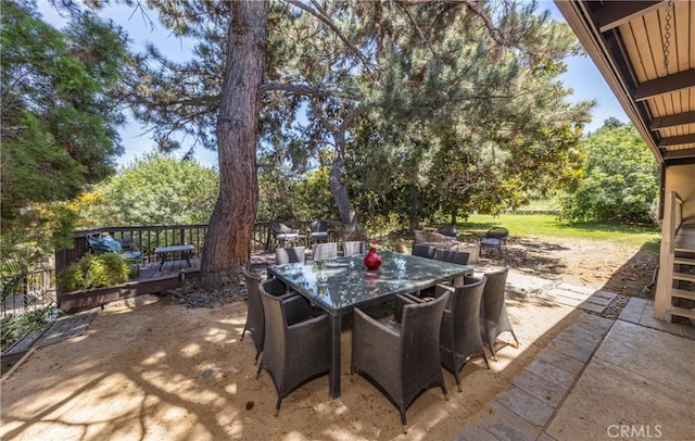 1653 W Cypress Ave, Redlands, CA 92373 - view of patio featuring outdoor dining area and a deck