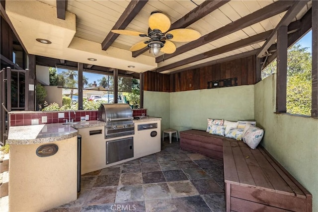 1653 W Cypress Ave, Redlands, CA 92373 - sunroom / solarium with an outdoor kitchen, plenty of natural light, a ceiling fan, and beamed ceiling